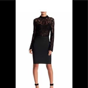 WOW COUTURE brand. Black lace and Bondage bottom dress. Fits S&M.Stretchy